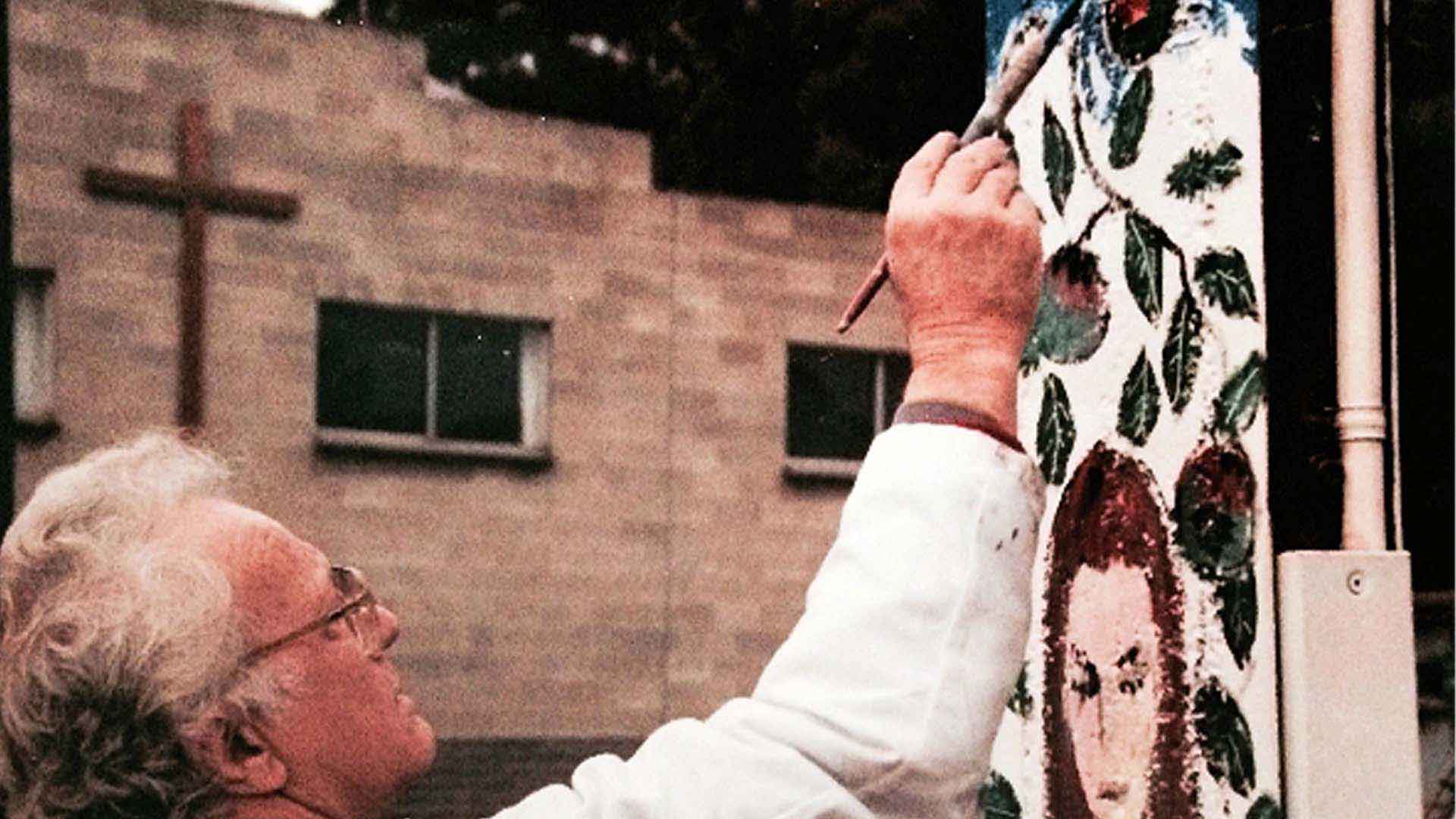 Clifton Pugh painting a stobie pole