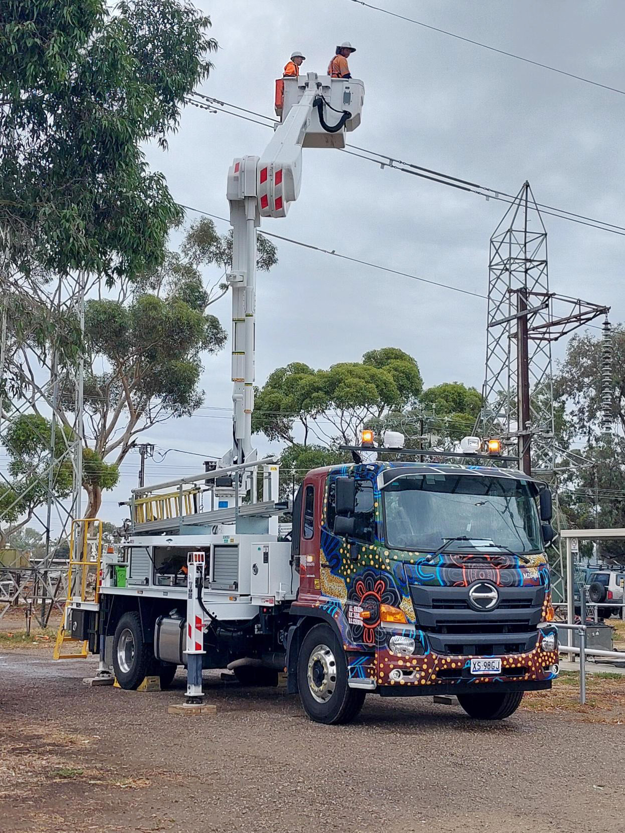 Participants in the the Aboriginal Pathways to Success Industry Immersion Week go in an EWP truck.