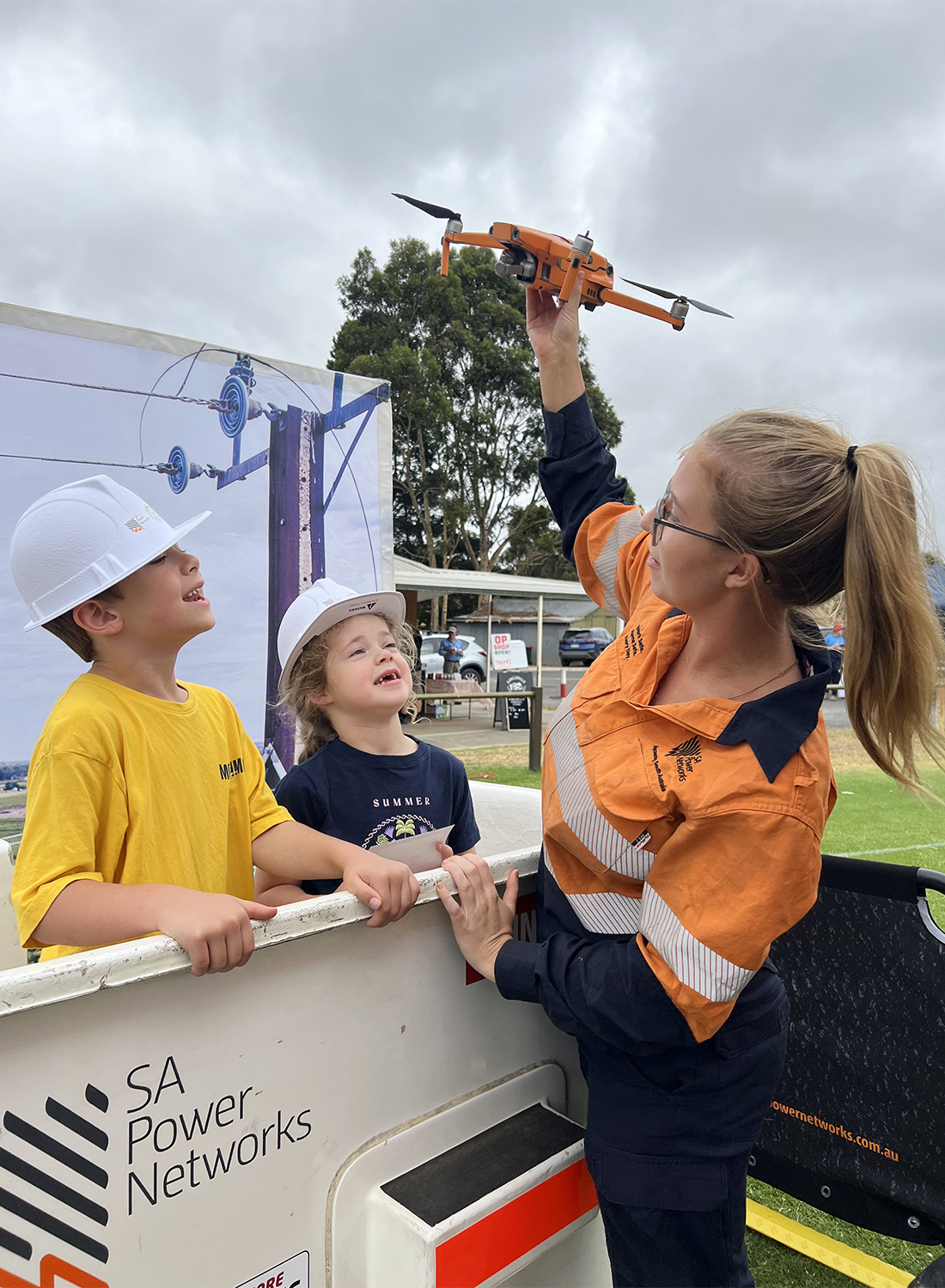 Children learn about how we use drones to inspect powerlines during the Kangarilla COmmunity Day.