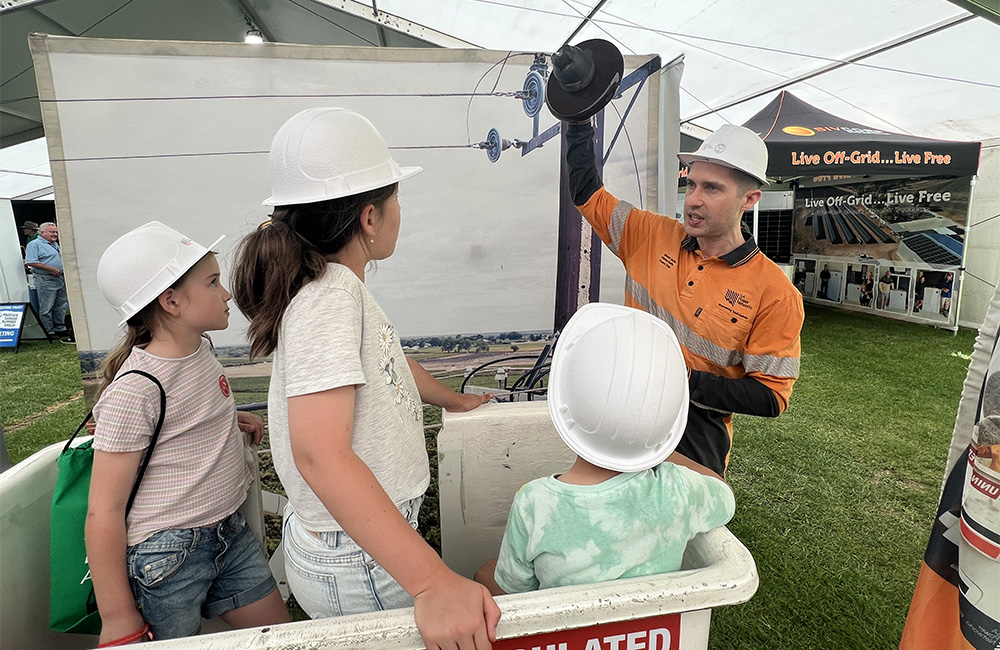 Children learn about how we find and fix faults on the network during the South East Field Days.
